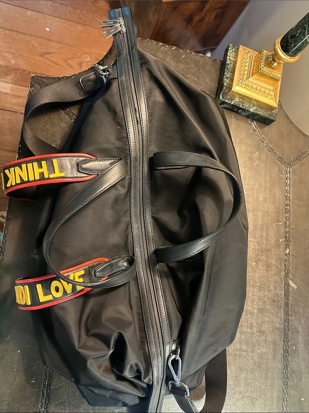 Fendi Black Duffel Bag with Yellow and Red Logo Straps